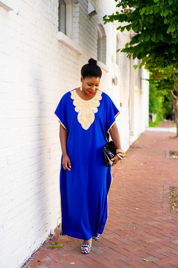 How to Wear an African Boubou, tips featured by top Atlanta fashion blogger, Hurry in Time: lady in blue boubou dress outside