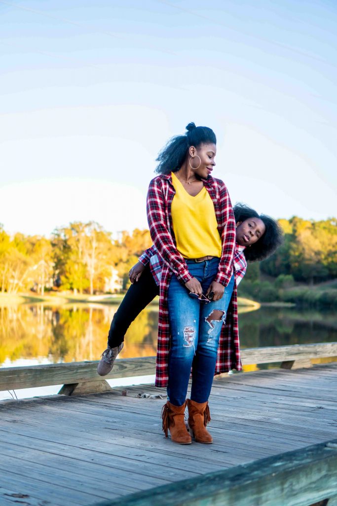 How to Address Family Nostalgia During the Holidays, tips featured by top Atlanta lifestyle blogger, Hurry in Time: Woman and girl standing on a bridge posing 